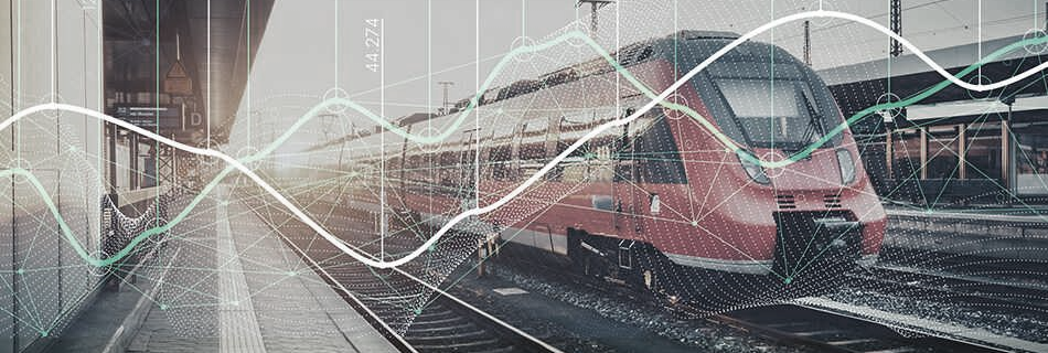 Abstract image of train at station overlayed with geometric patterns and graphs
