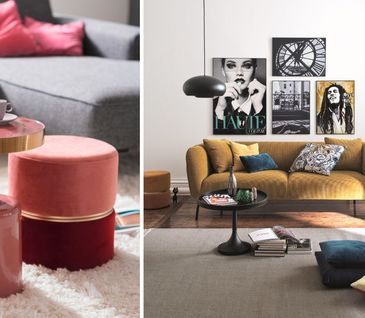 Pinker Beistelltisch neben einem Pinken Hocker neben einem gelben Sofa mit bunten Kissen dekoriert und bunten Kissen am Boden.