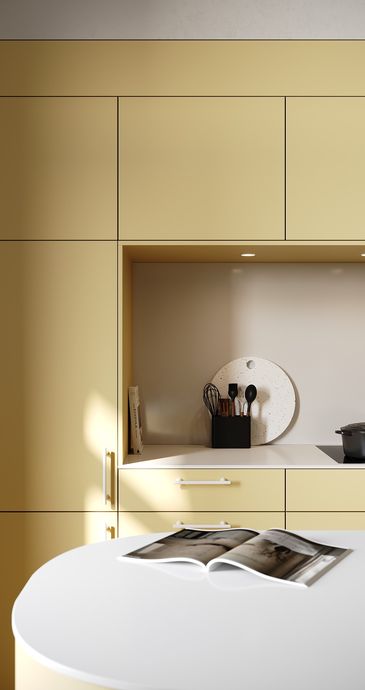 Schrankwand einer buttergelben Küche der Marke Contur