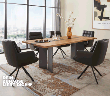 Massivholz-Esstisch mit Epoxy in elegantem Esszimmer mit schwarzen Lederstühlen.