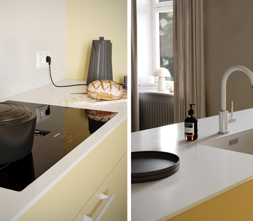 Kochfeld mit Topf und Wasserhahn mit Waschbecken der buttergelben Küche von Contur