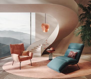 Liege in petrolfarbenem Leder in futuristischem Wohnzimmer neben Sessel.