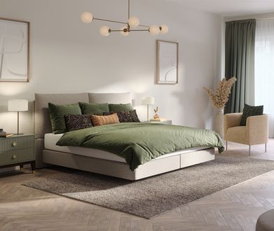 Beiges Bett mit olivgrüner Bettwäsche in hellem Schlafzimmer.