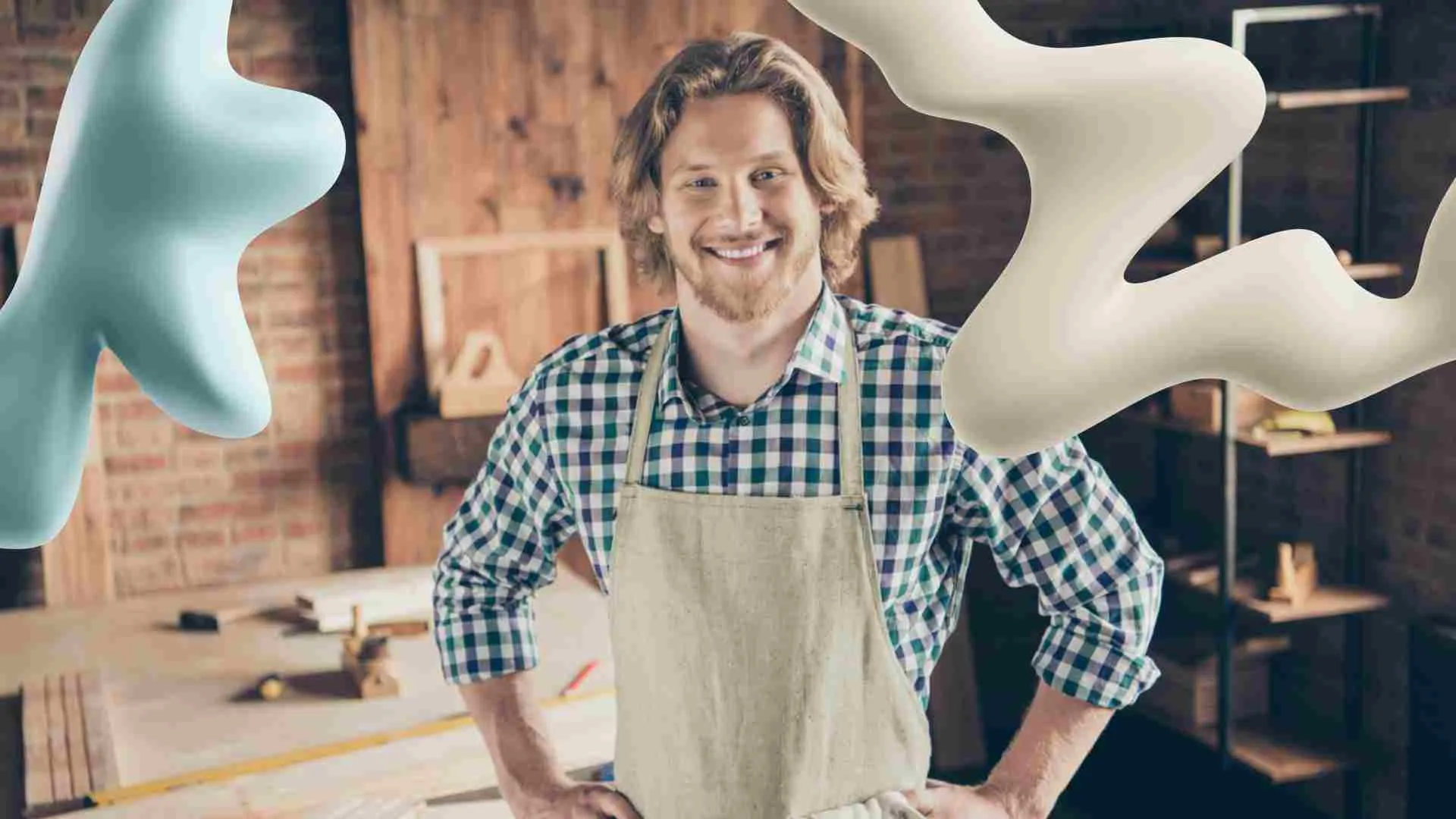 A happy male artisan in a work apron smiles in his studio, with light blue and cream abstract shapes floating around him.