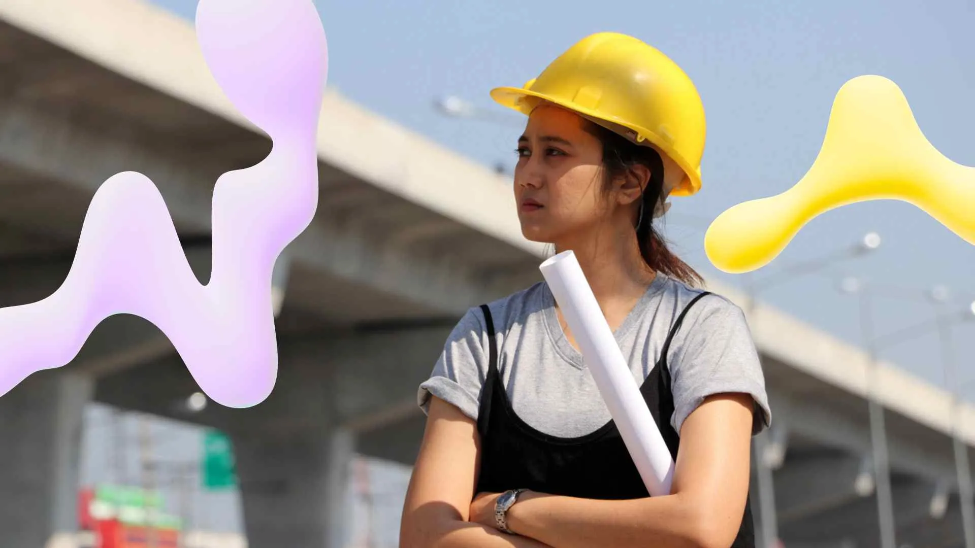 Young woman in yellow hard hat holding rolled plans, looking thoughtfully at a construction site with concrete overpasses and graphic shapes.