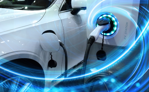 Electric vehicle being charged