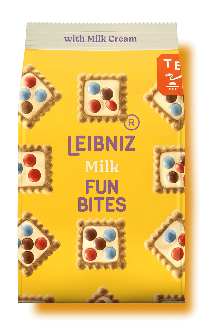 Opakowanie ciastek Leibniz Fun Bites Milk z kolorowymi czekoladowymi drażetkami na żółtym tle