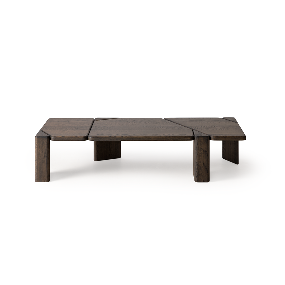 Modern low wooden coffee table with a dark finish, featuring a unique three-section design and sturdy legs, set against a white background.
