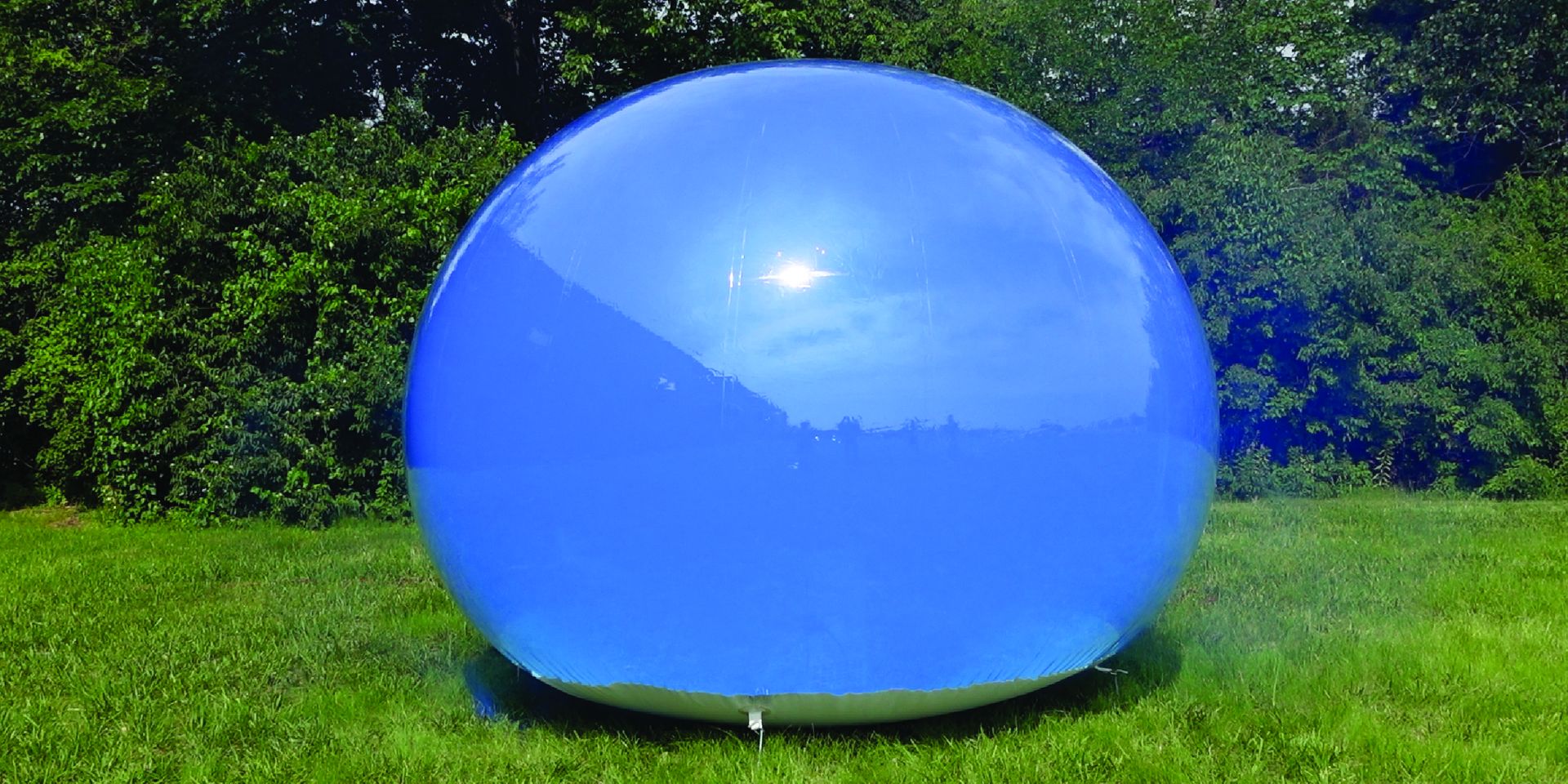 A clear bubble filled with blue smoke
