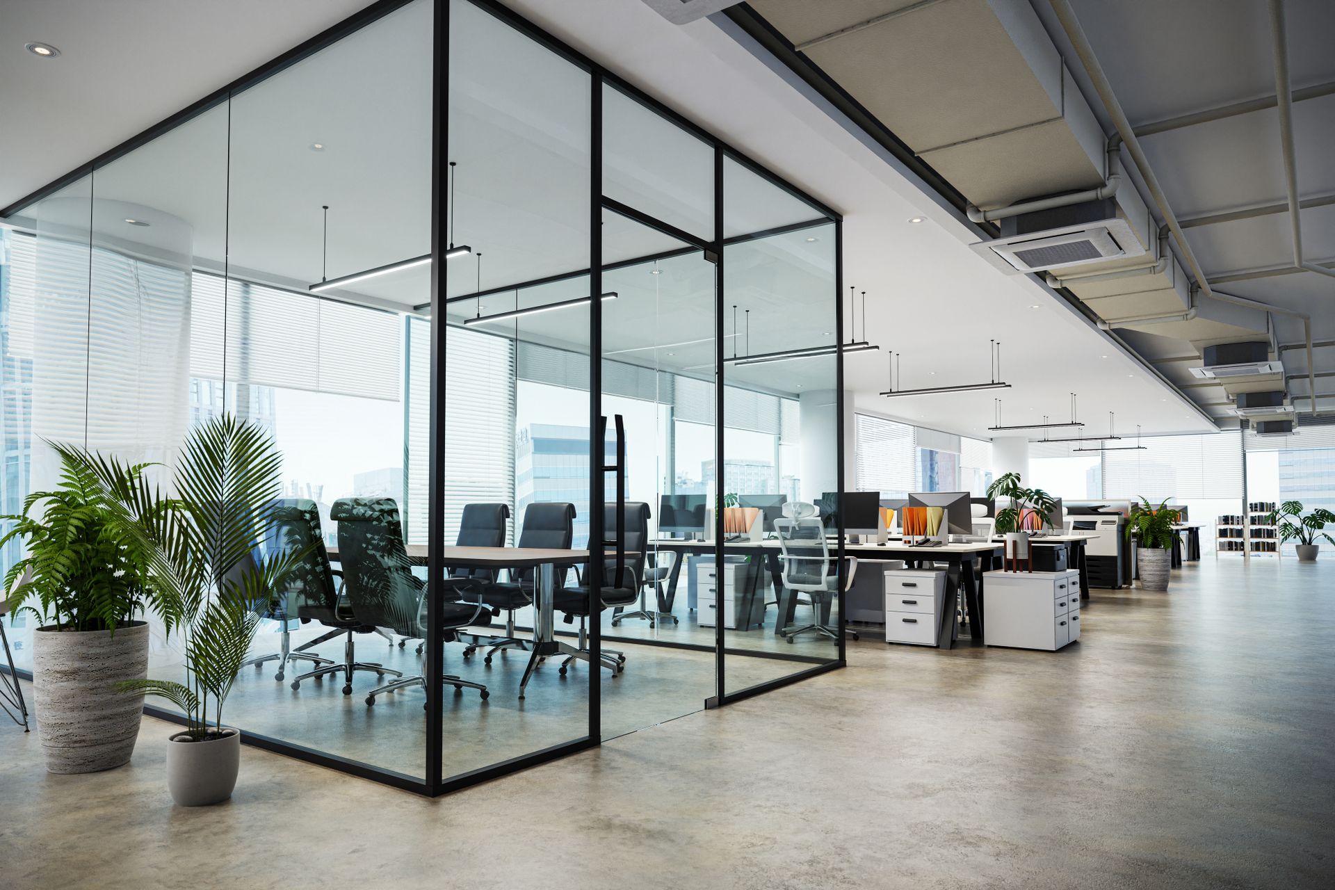 Image of an office with a glass conference room