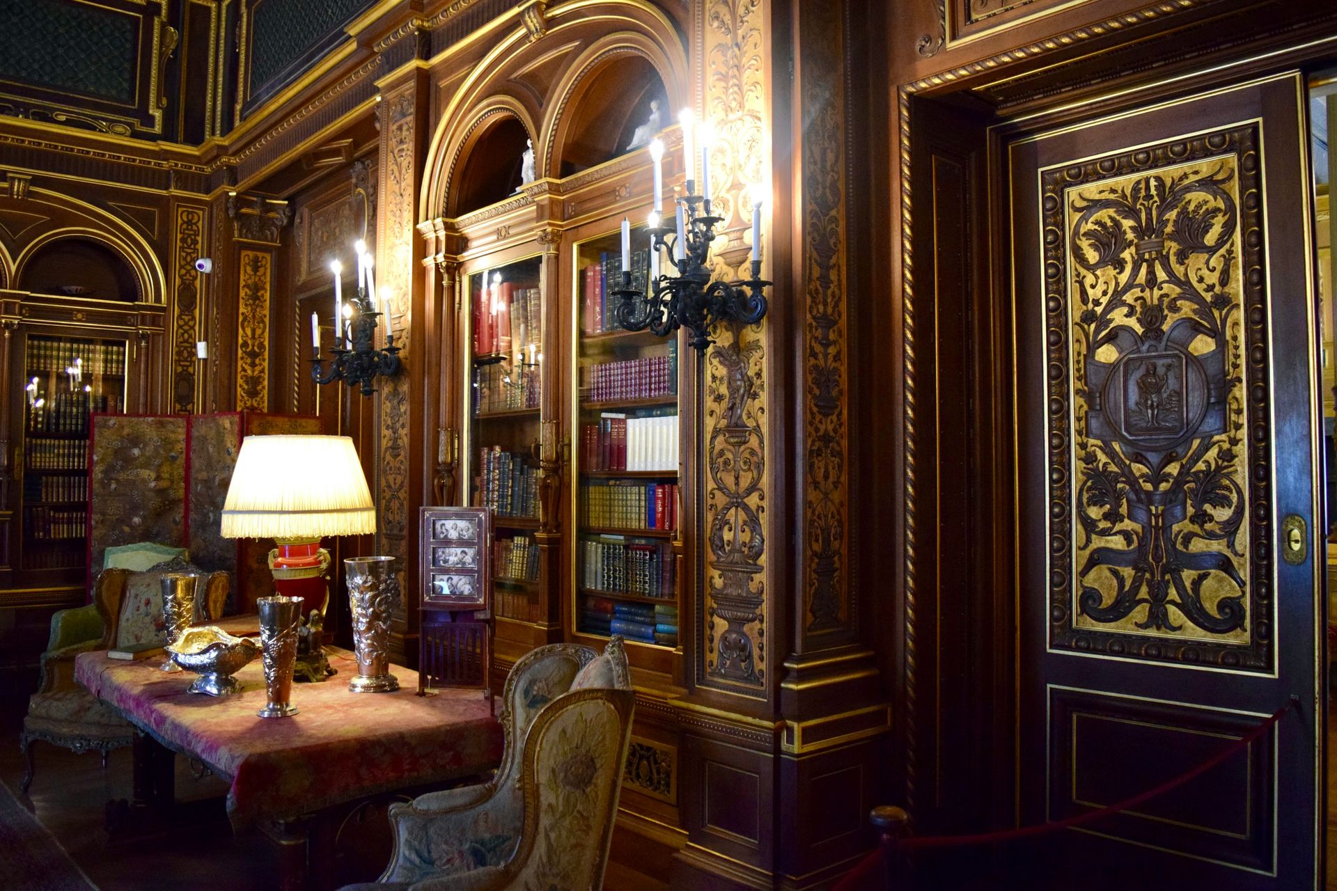 A view of a study likely from an exquisite, Victorian style mansion or castle