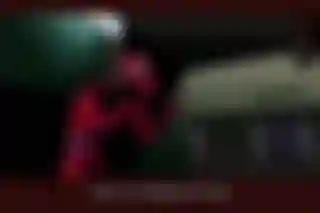 An image from the game "Killer7" portrays Iwazaru, a helpful hint-giving ghost