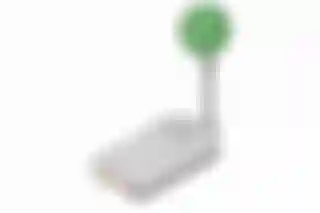 A Dreamcast microphone against a white background