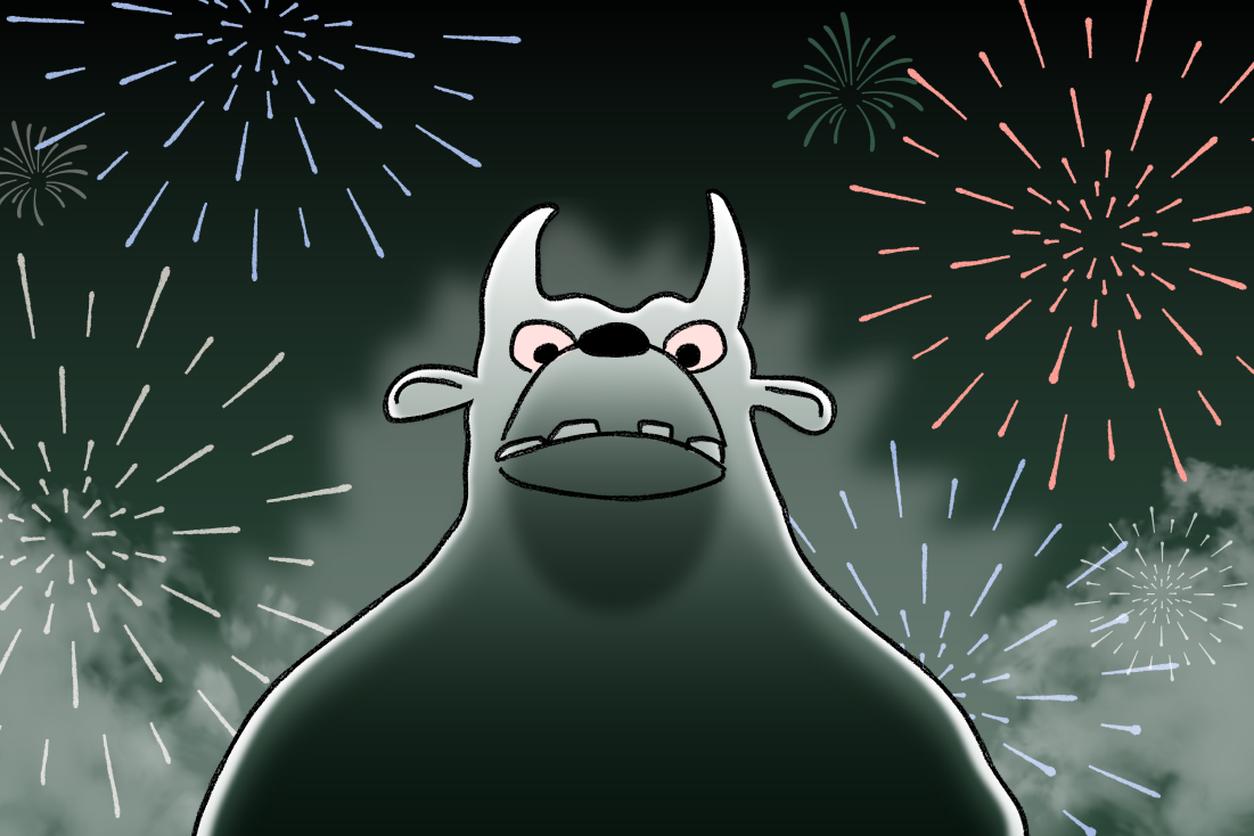 A scary fireworks monster stands in the sky