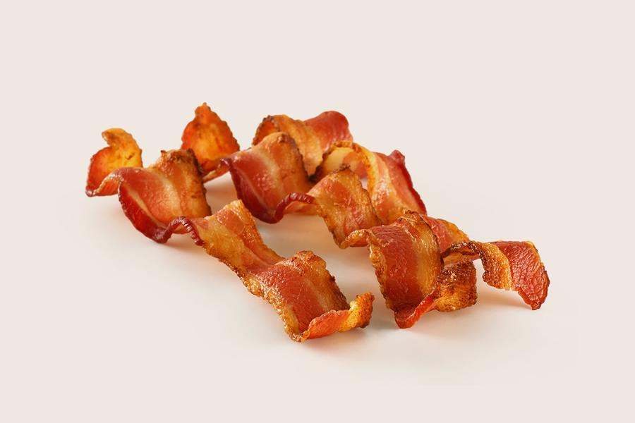 Bacon on beige background