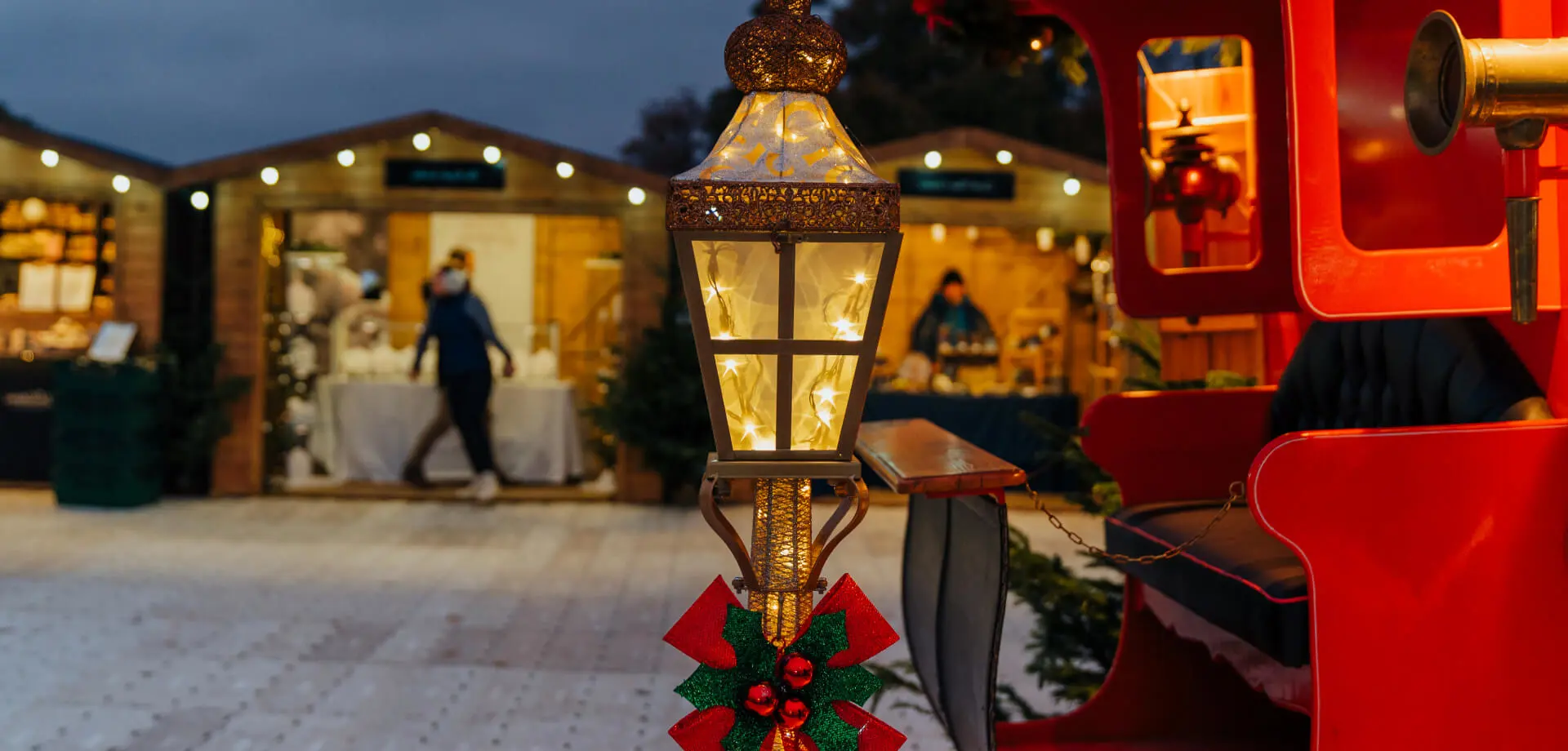 Image of Chatsworth market, with the camera focusing on a festive lamp with the market blurred in the background