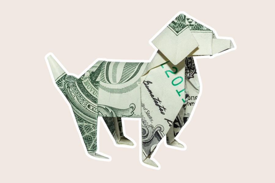 A paper maché dog made out of dollar bill cut out with a white outline, on a beige background