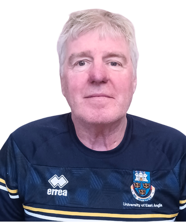 headshot of ollie smiling at camera