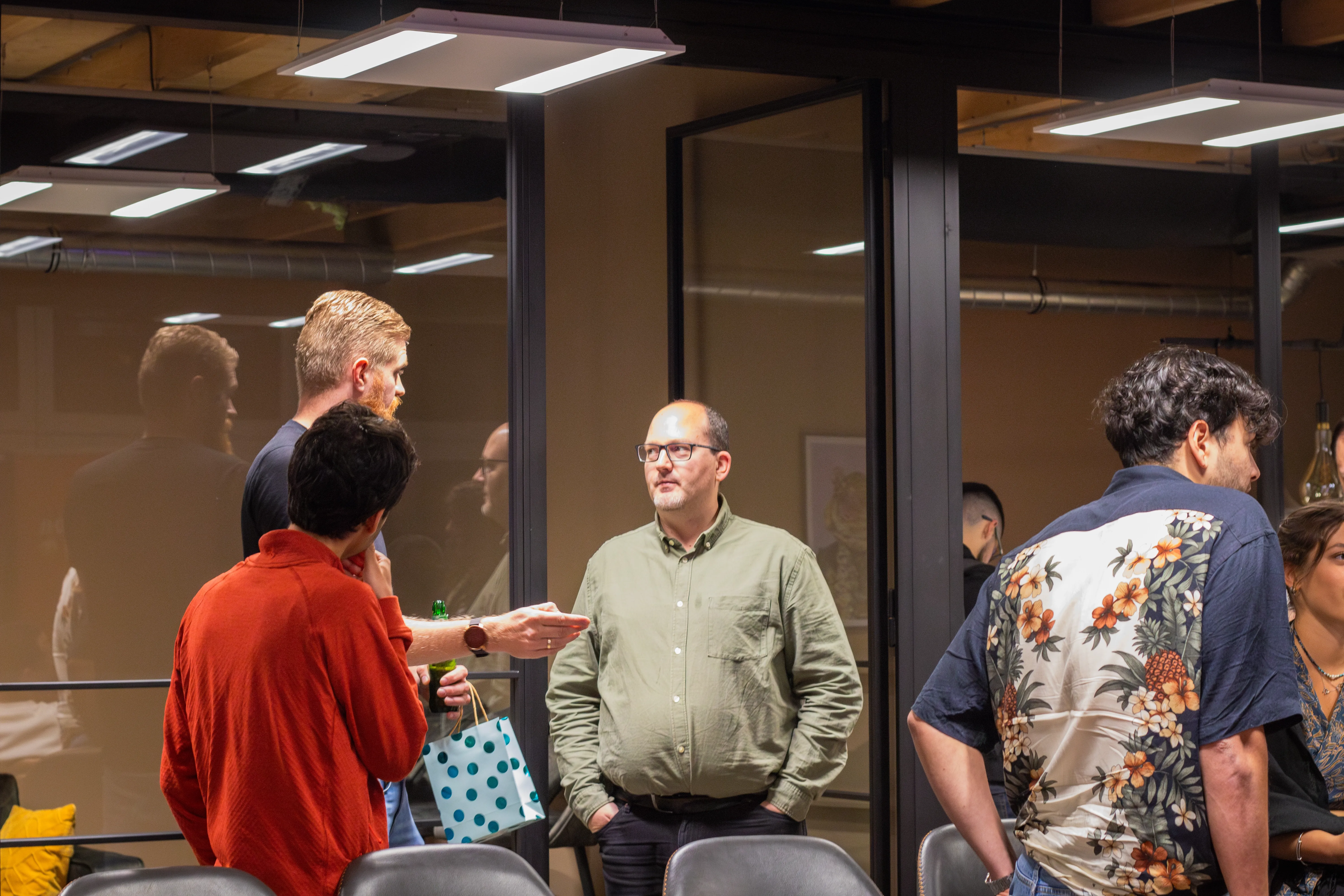 People standing and talking during the networking part of the web development meetup