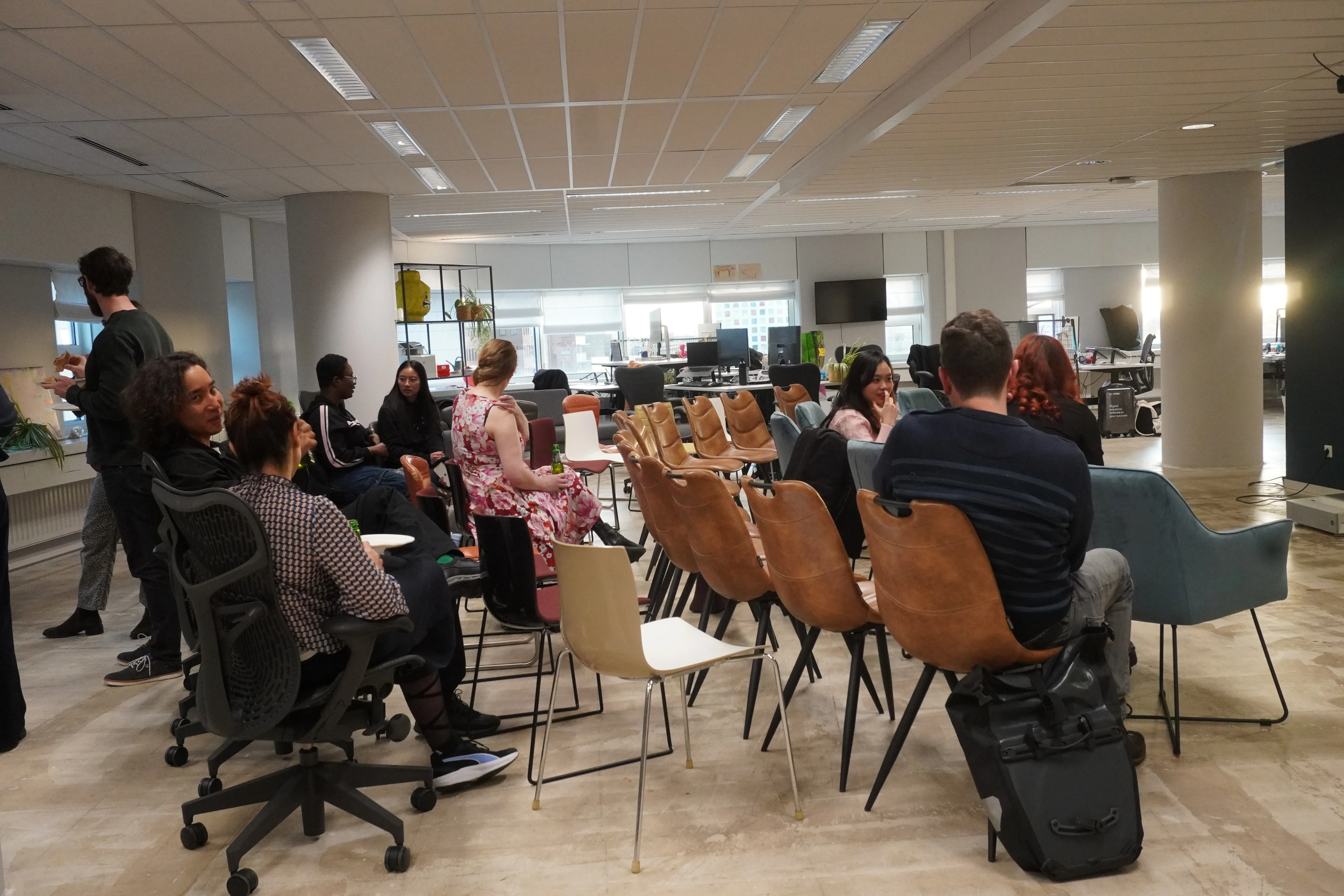 audience of the accessibility meetup seated and networking