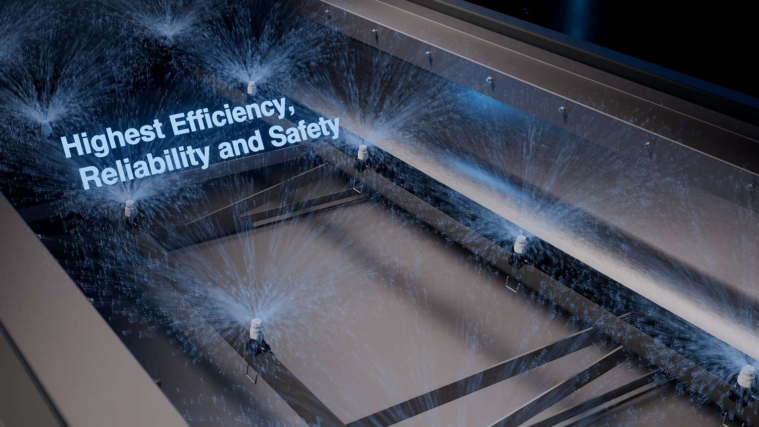 Sprühdüsen kühlen ein Stahlband von unten, Einblendung „Highest Efficiency, Reliability and Safety“
