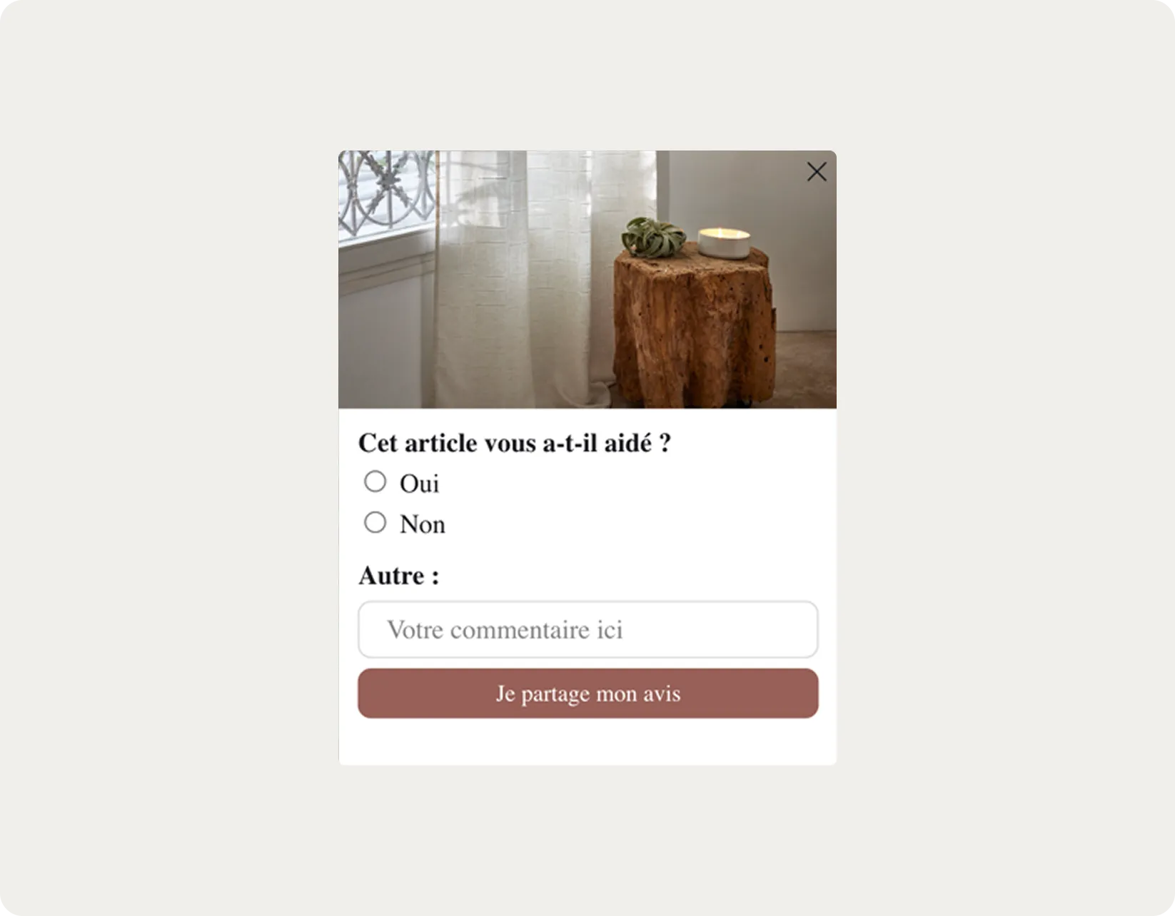 Feedback form with options "Oui" and "Non" below a rustic table with a candle and greenery, near a window with sheer curtains.