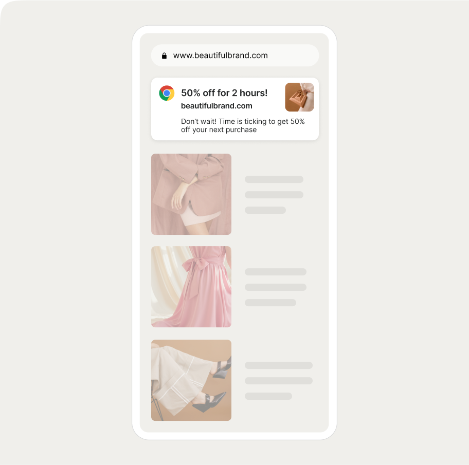 Smartphone screen displaying a web push with a 50% off sale and images of stylish outfits in neutral and pink tones.