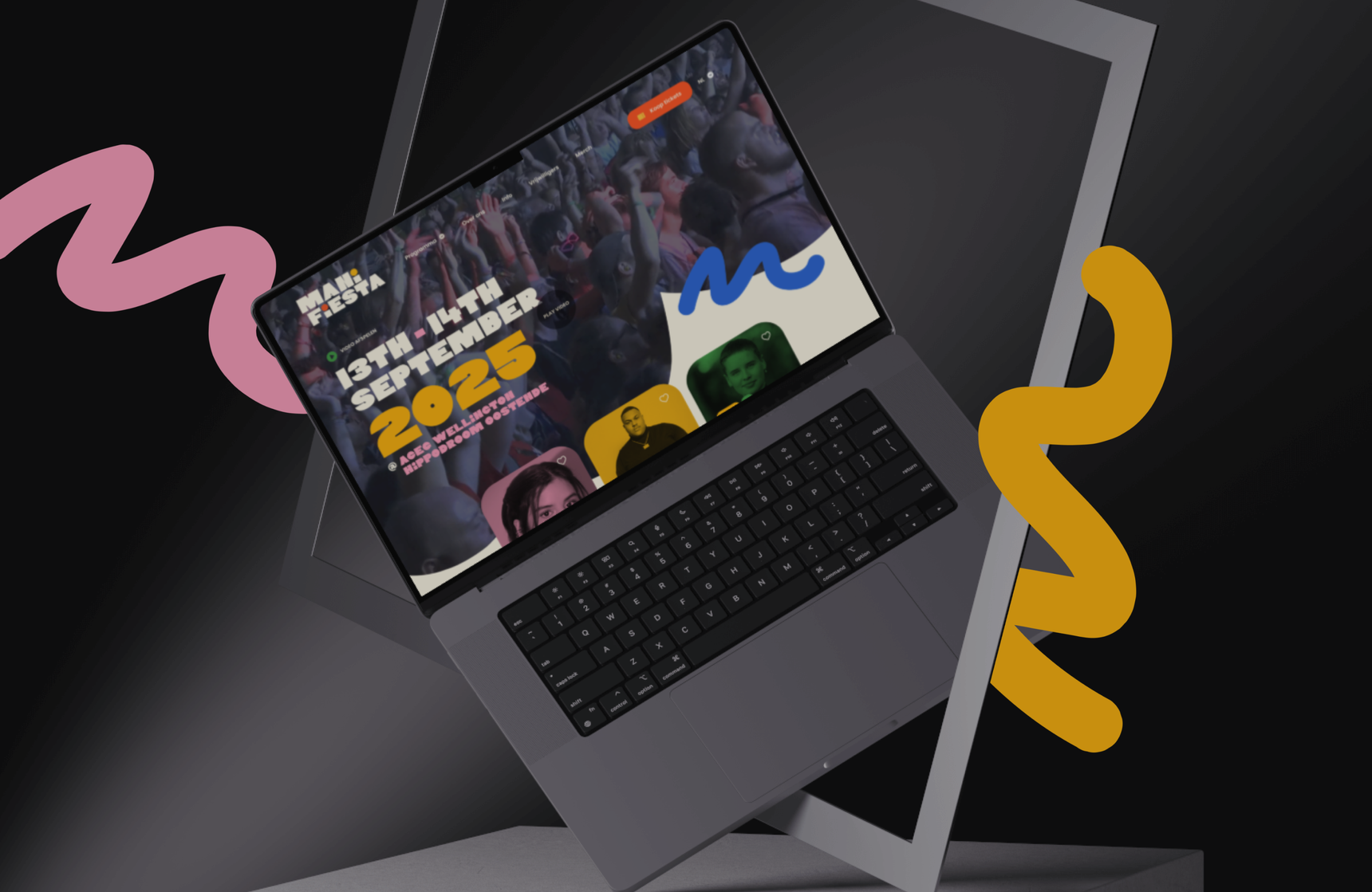 Laptop displaying a colorful event website for "13th September 2025," surrounded by abstract shapes on a dark background.