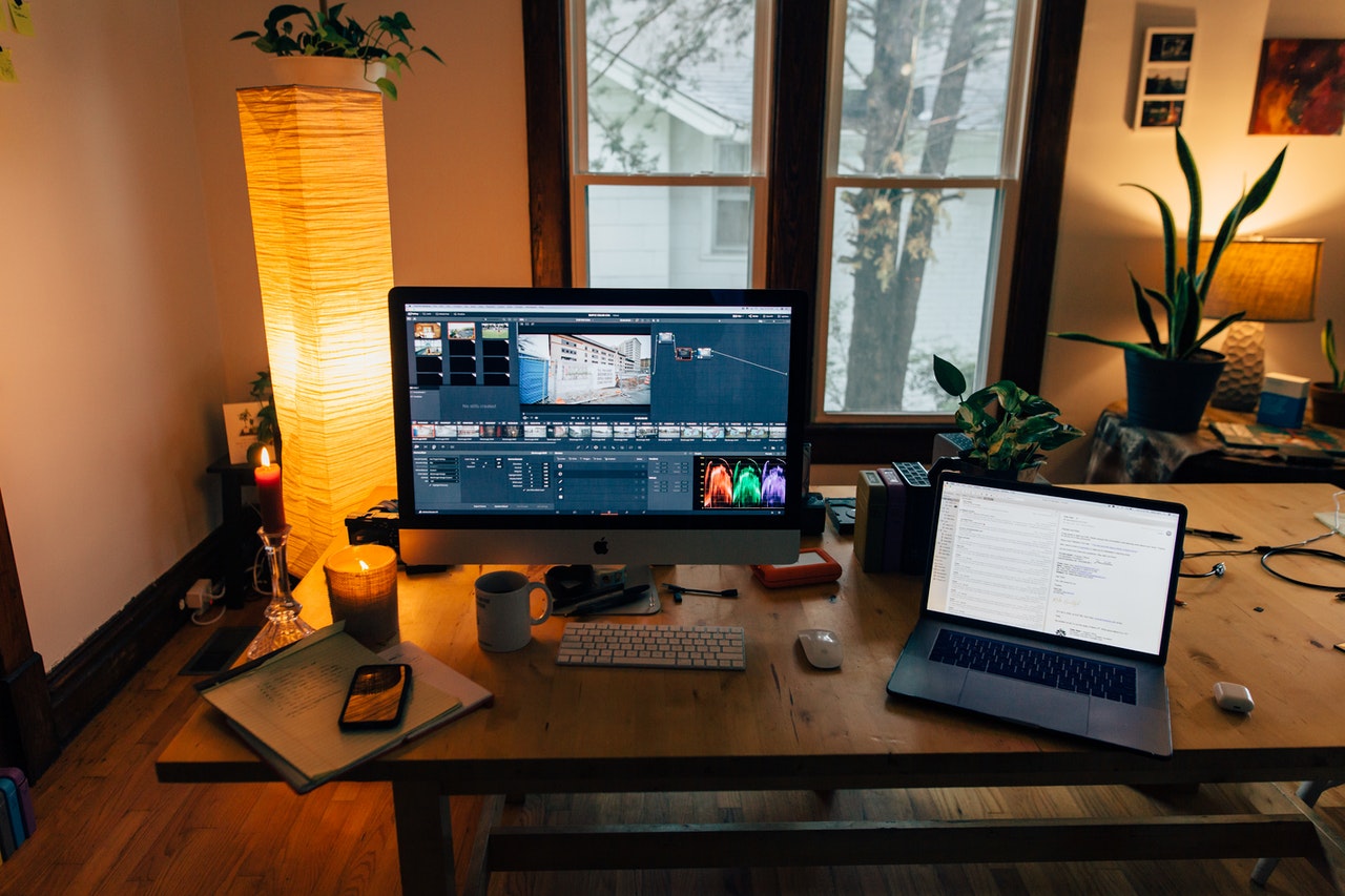 computer with video software in a cozy room