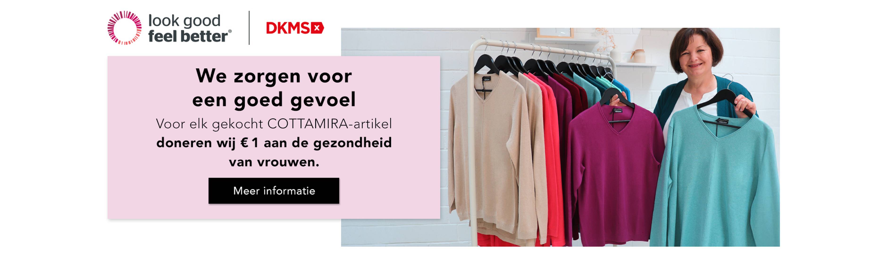 Een vrouw staat naast een kledingrek met kleurrijke truien en maakt reclame voor een liefdadigheidsinitiatief voor de gezondheid van vrouwen.