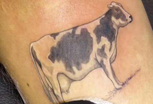 tatuaje de vaca de Camilo