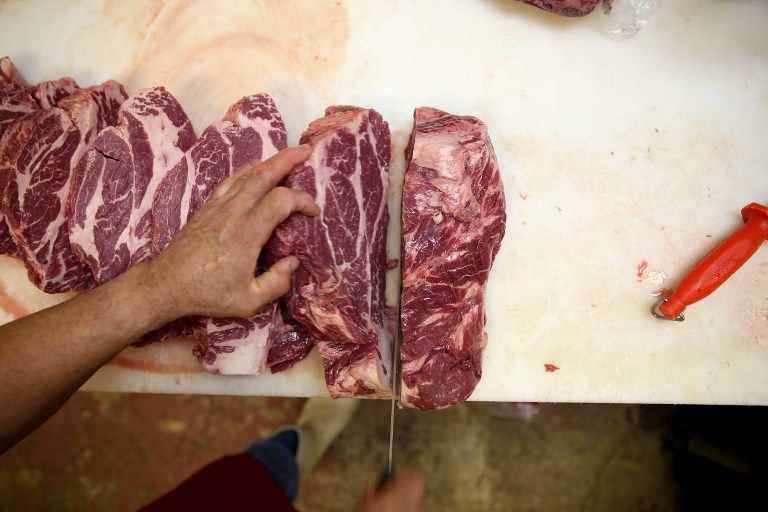 A fines del año pasado, ambos países habían acordado una agenda para restablecer las transacciones comerciales. Foto: AFP. envíos de carne a venezuela