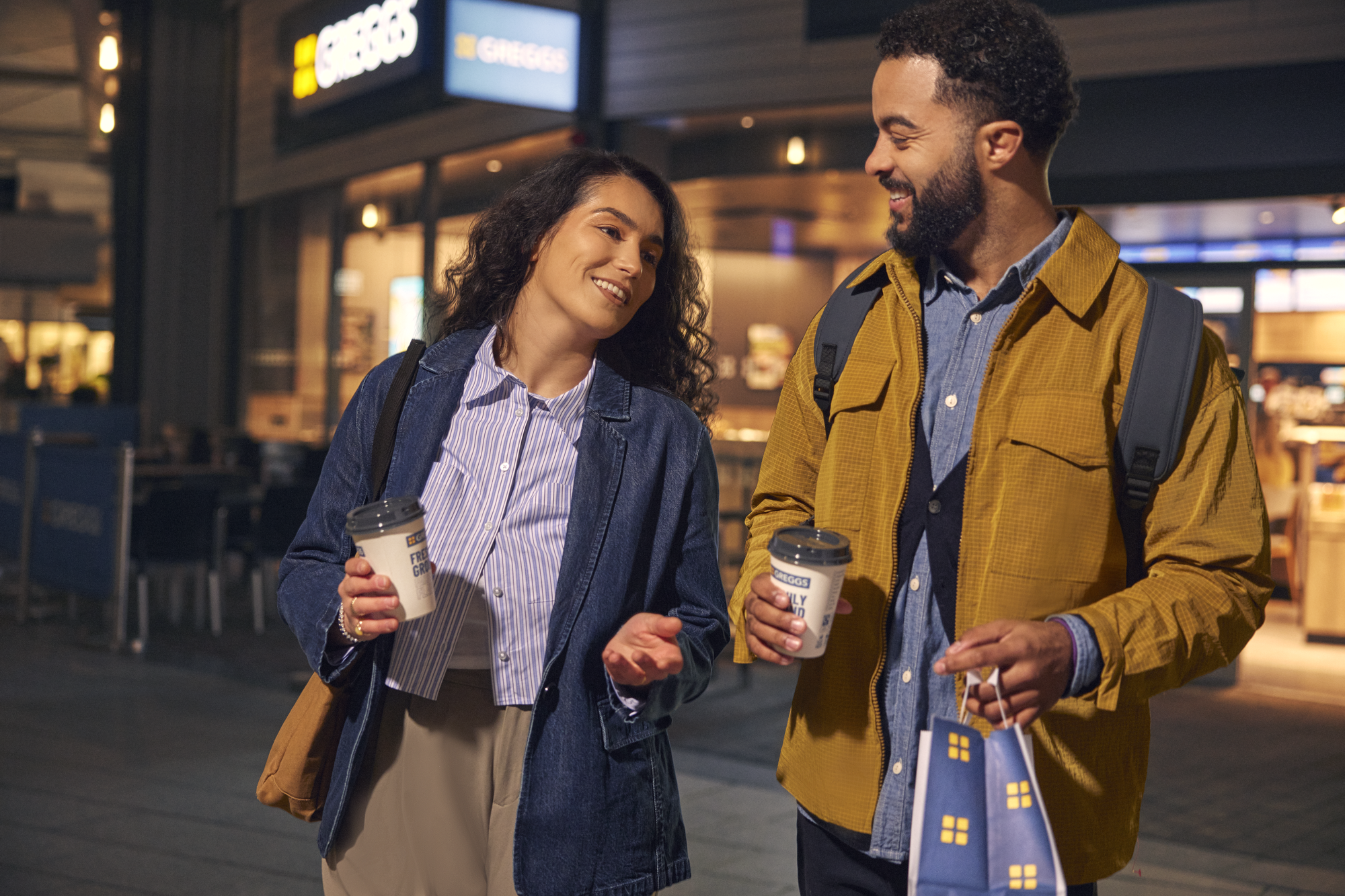 Customers outside greggs