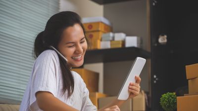 Woman on phone with customer