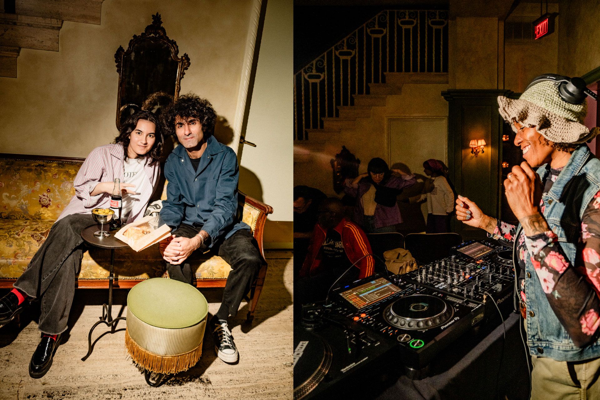 Two people sit on a vintage couch with drinks. Nearby, a DJ in a floral shirt and hat plays music in a warmly lit room.