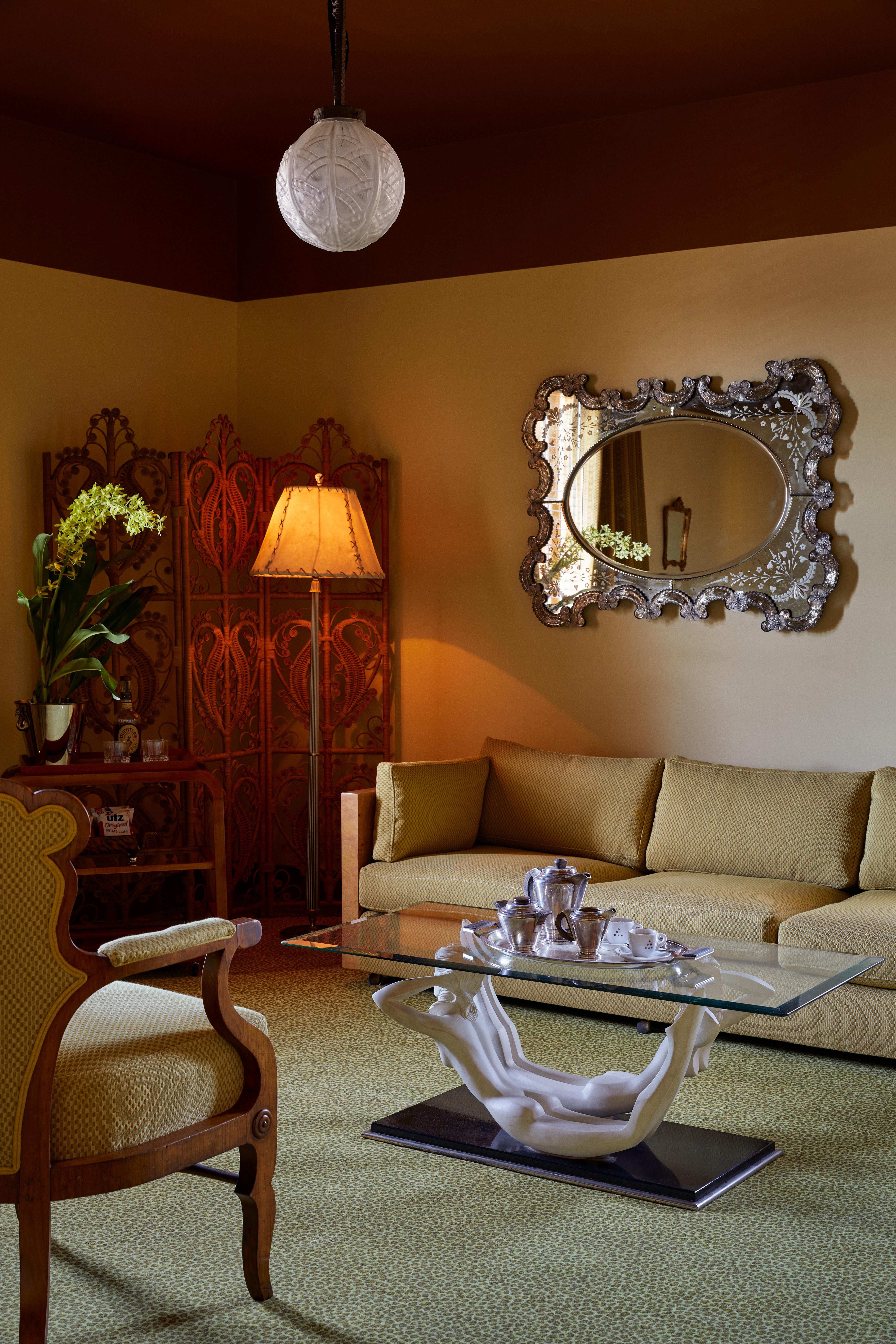 Baltimore Hotel Ulysses The Tomorrow Suite seating area, glass coffee table, leopard print carpet