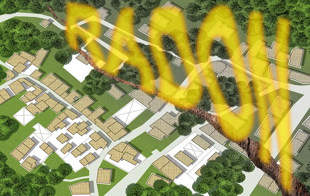 Luftaufnahme einer Siedlung mit großen, gelben Schriftzügen „Radon“, die auf die Notwendigkeit der Radonvorsorge in betroffenen Regionen hinweisen