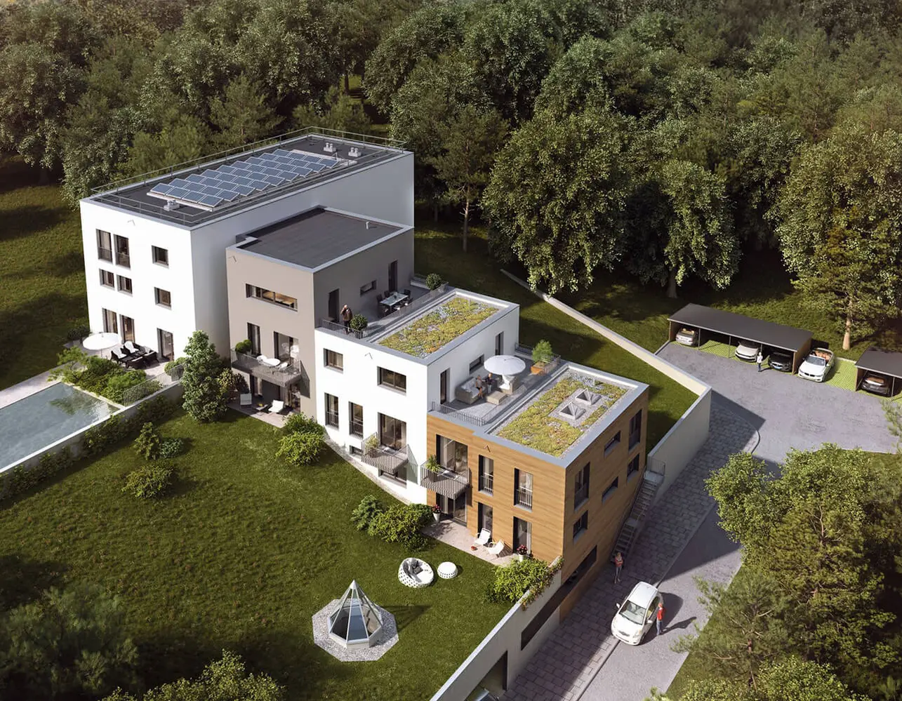 Moderne Wohnanlage am Waldrand mit begrünten Flachdächern und Dachterrassen
