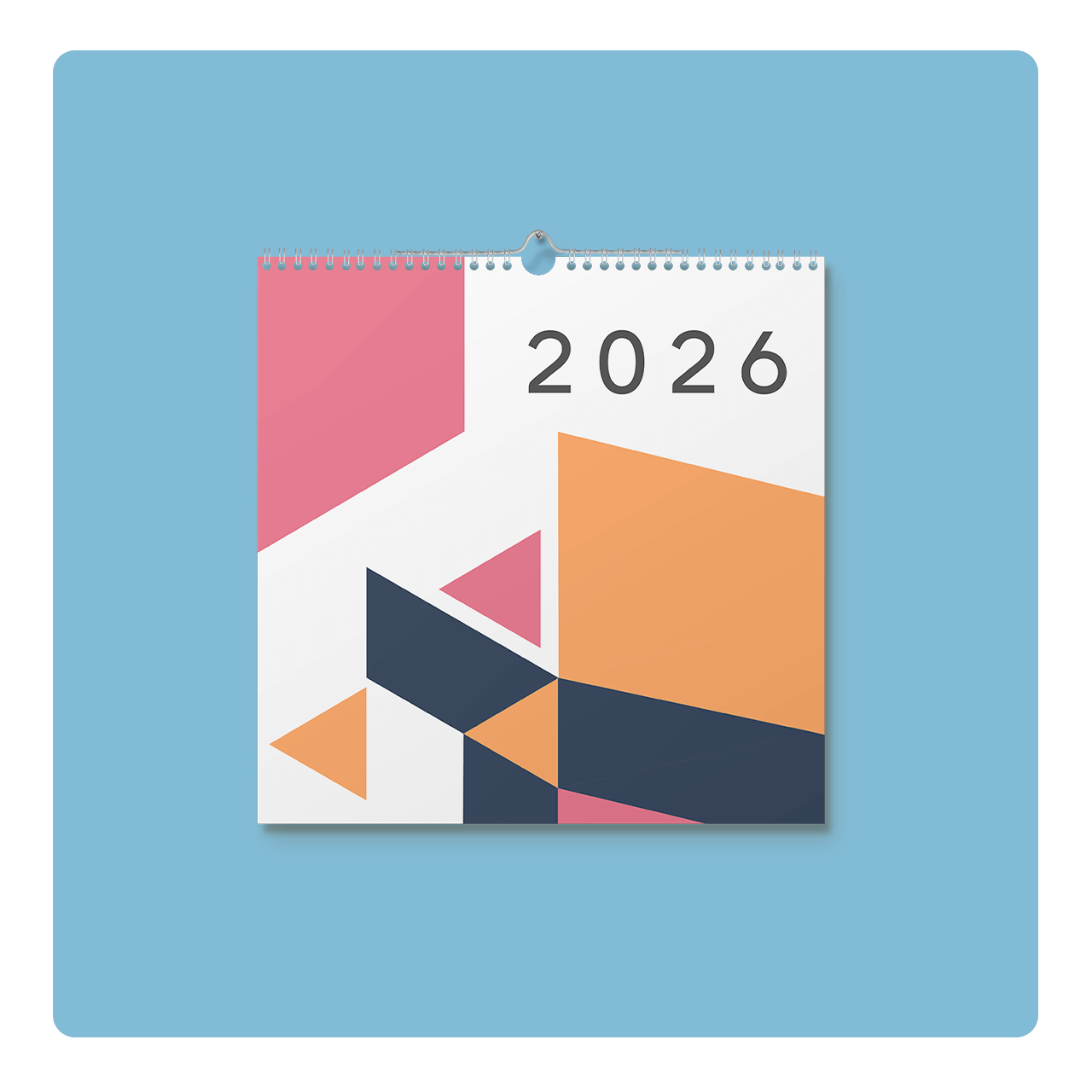Calendar for 2026 with abstract geometric design in pink, orange, and navy on a light blue background.