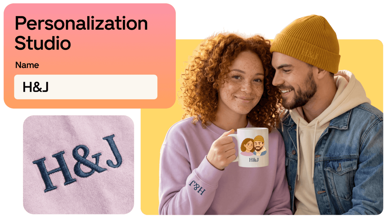 A couple smiles, holding a personalized mug. Text reads "Personalization Studio - Name: H&J" with H&J embroidery shown.