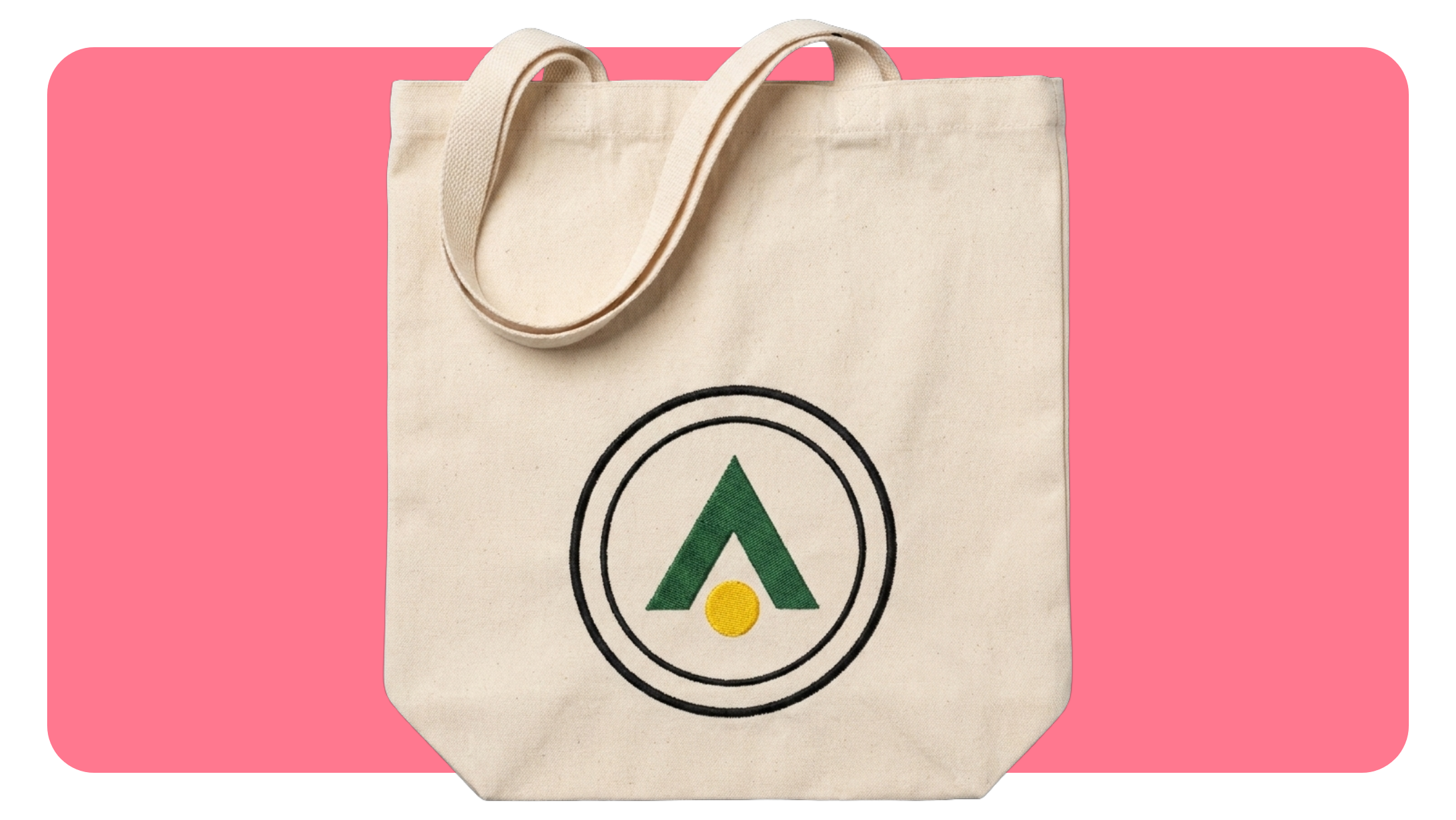 Natural canvas tote bag with a logo embroidered on the front panel through Gelato production on demand