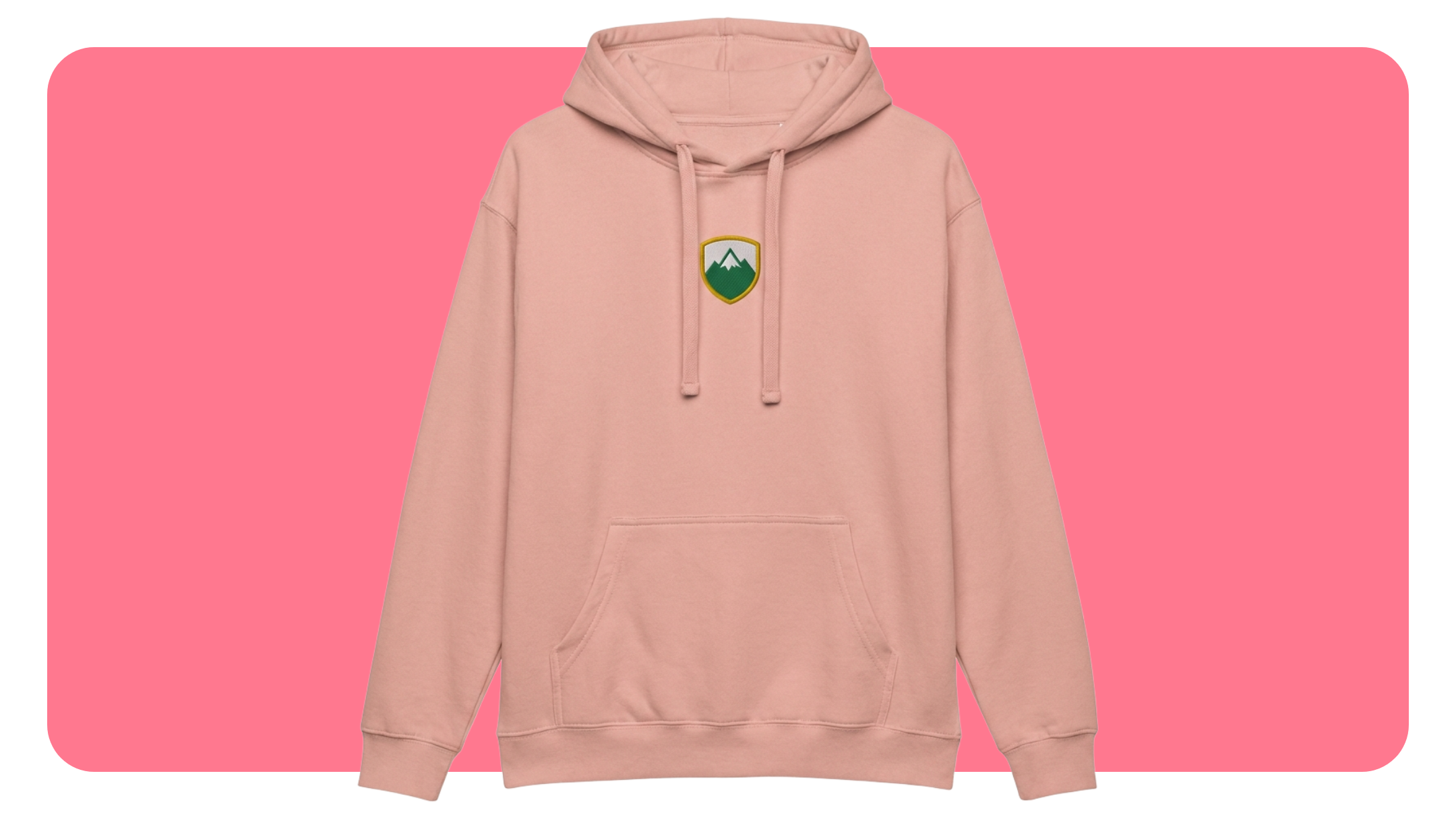 Blush pink hoodie with an embroidered shield-shaped patch emblem at the center chest, made through Gelato production on demand