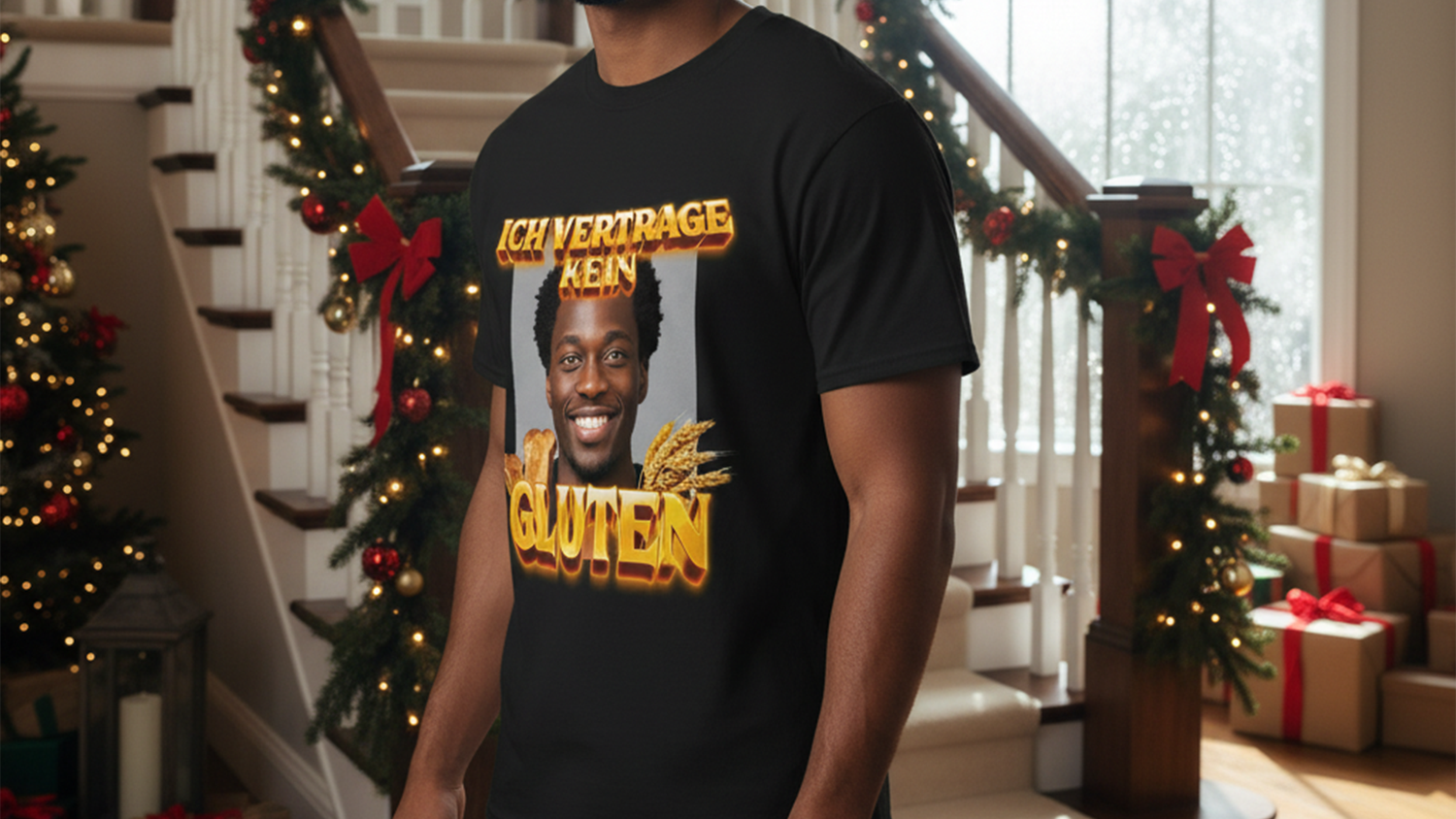 Man wearing a "Ich Vertrage Kein Gluten" T-shirt stands in a festive room with a decorated staircase and wrapped gifts.