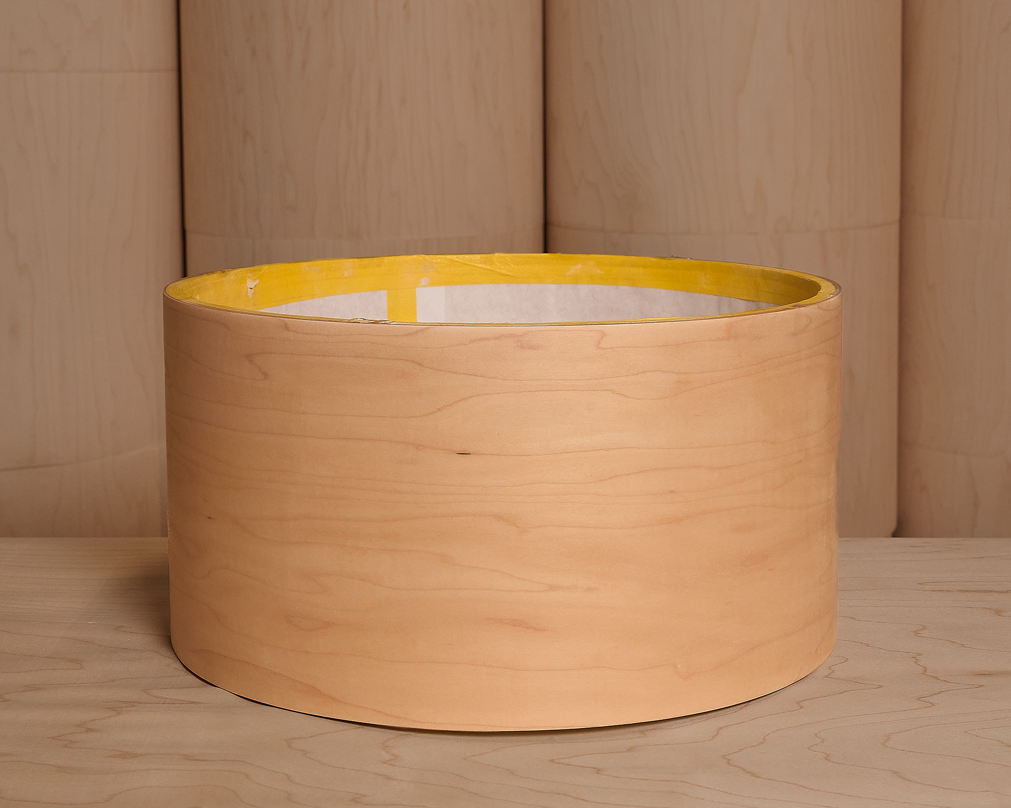A primer sanded maple shell