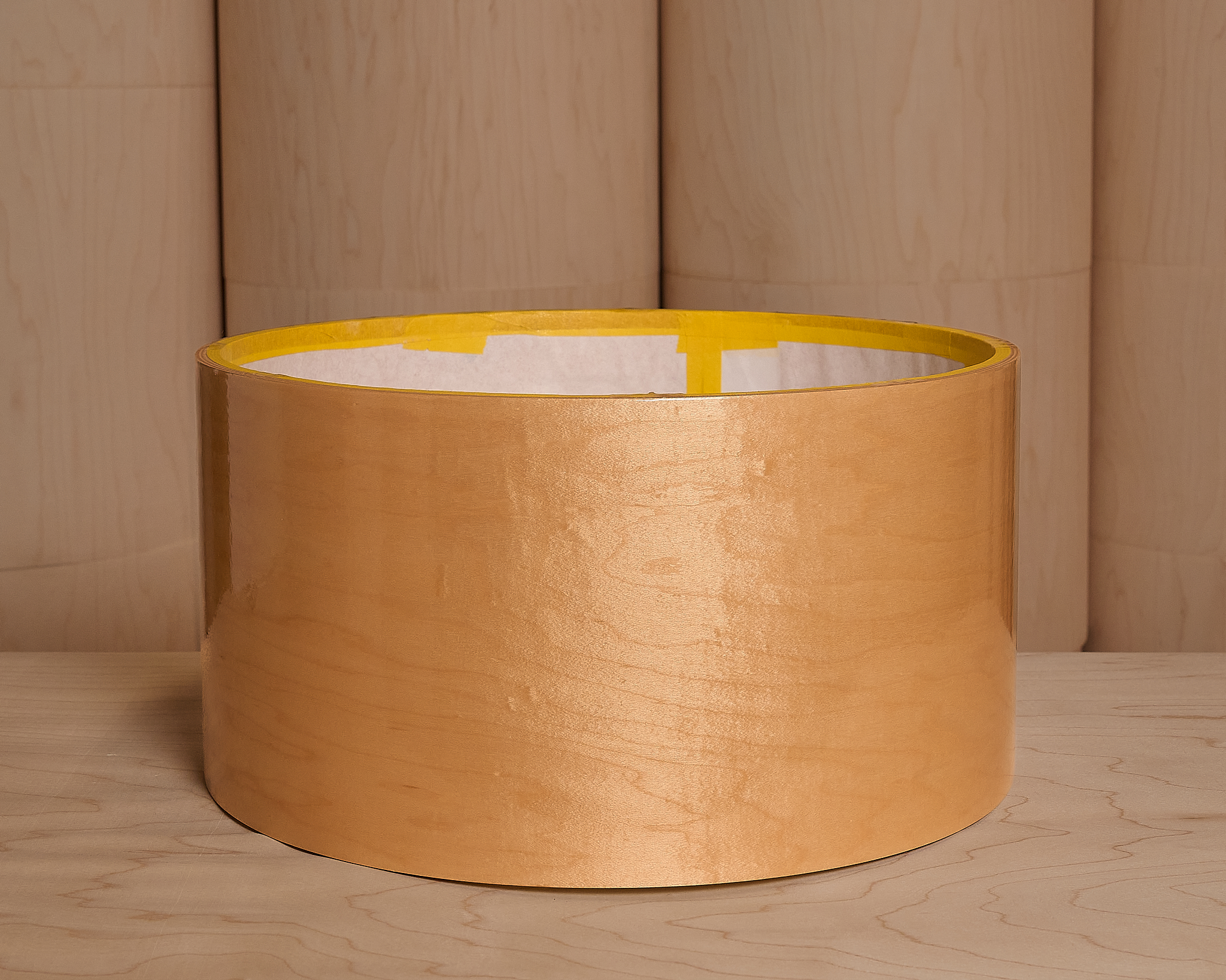 Primered maple drum shell.