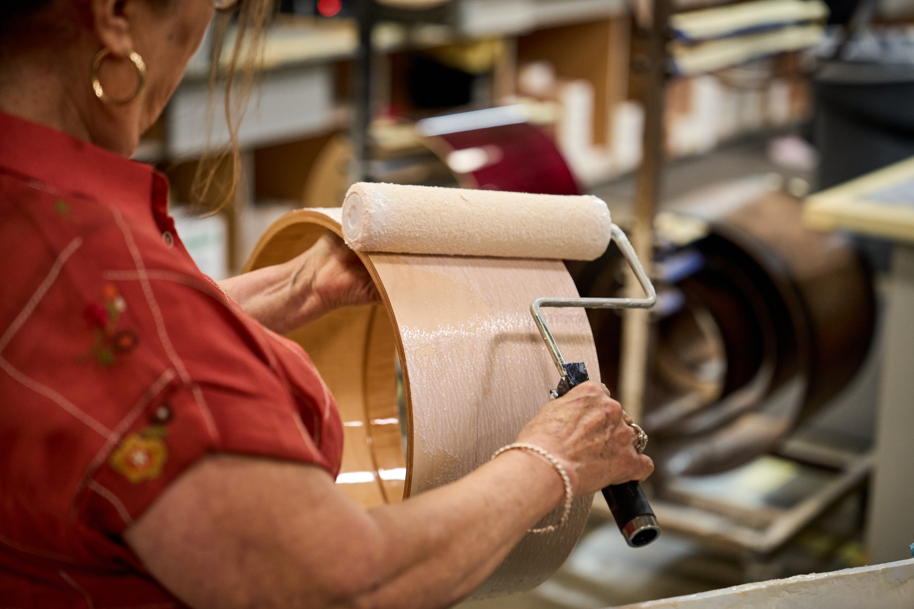Glue is hand-applied to every FinishPly shell exterior. Gluing shell for FinishPly