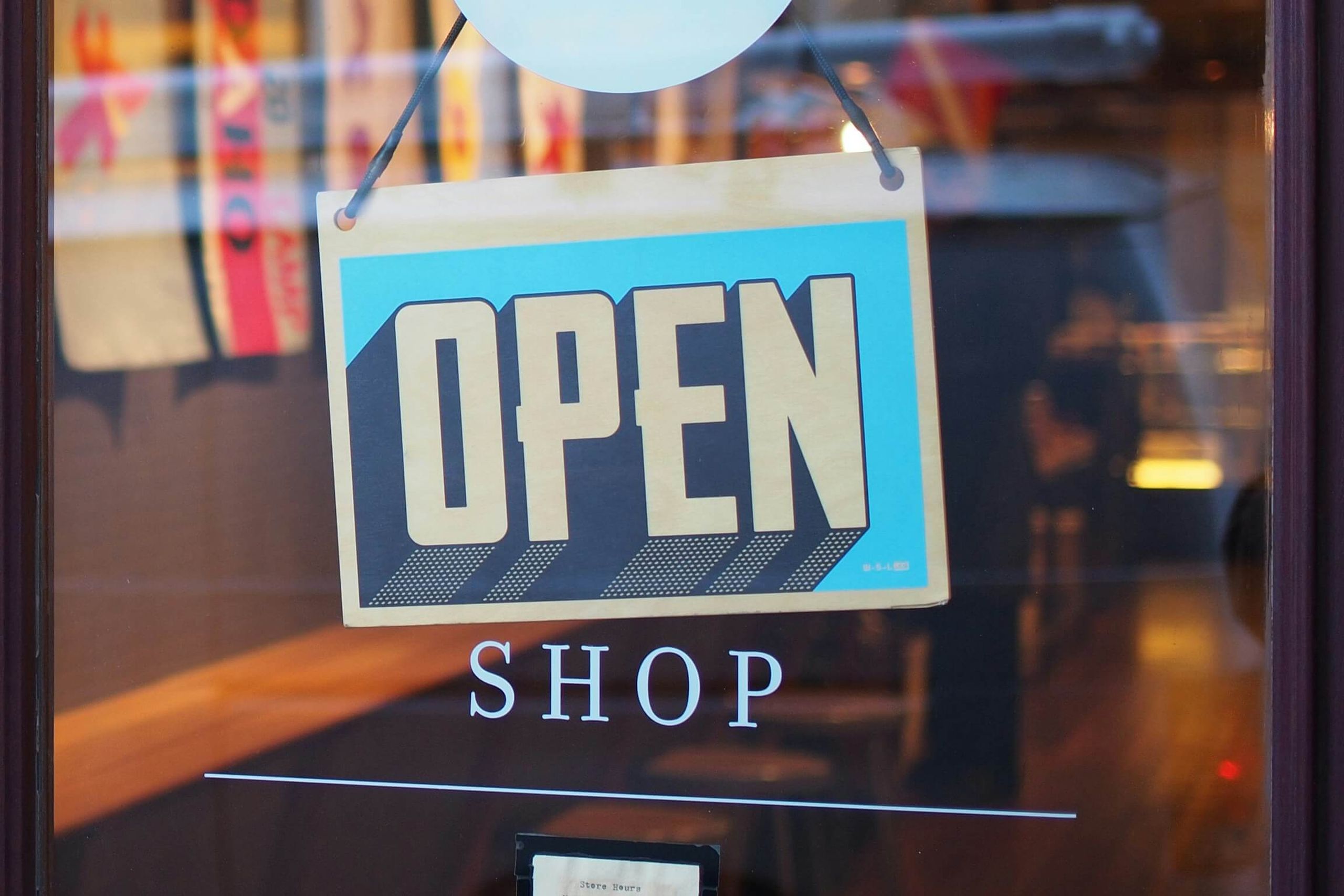 Shopping window with an open sign