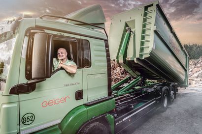 Geiger Mitarbeiter in LKW mit Container