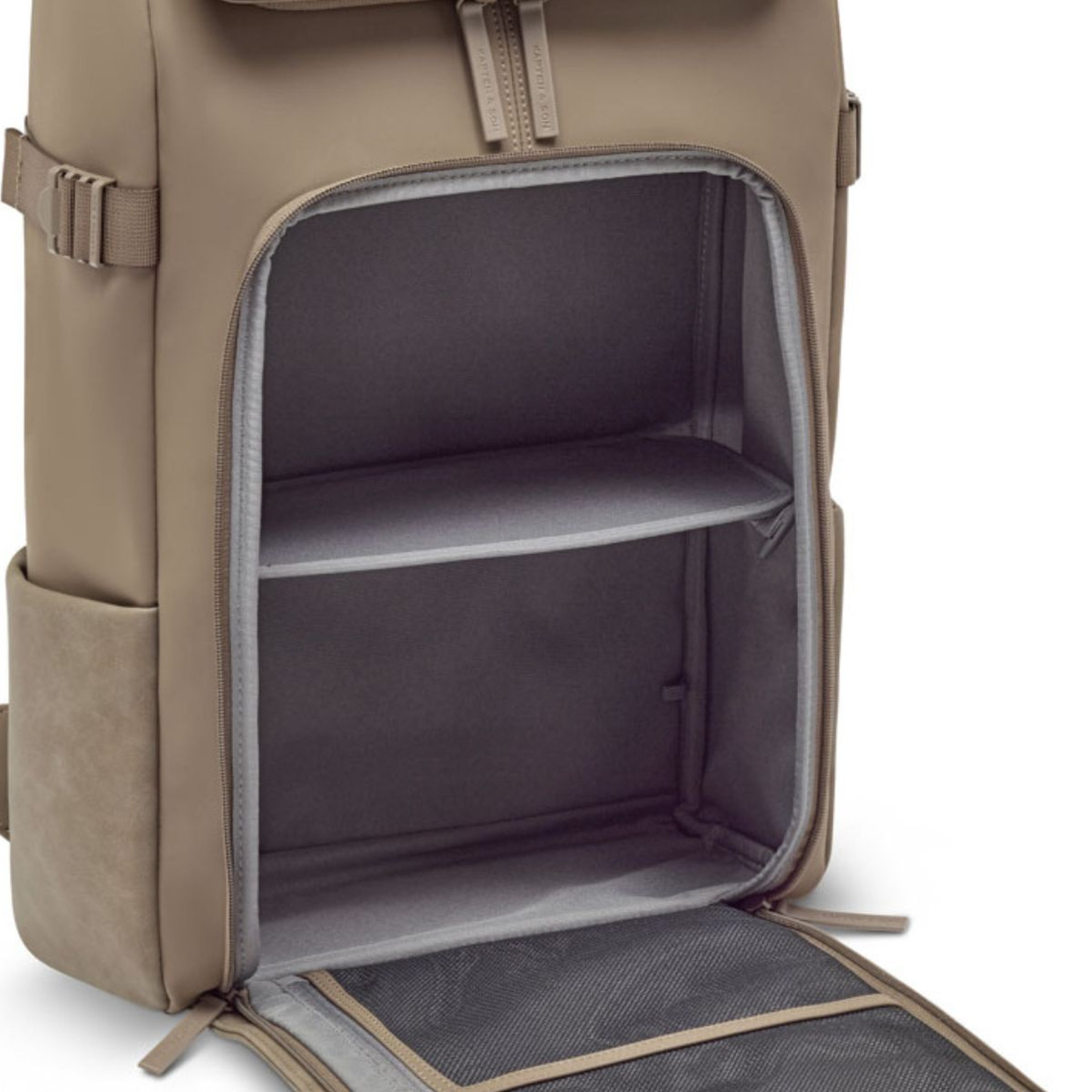 Open backpack showing spacious gray interior with two compartments, adjustable straps on sides, and mesh pocket on the flap, conveying functionality.