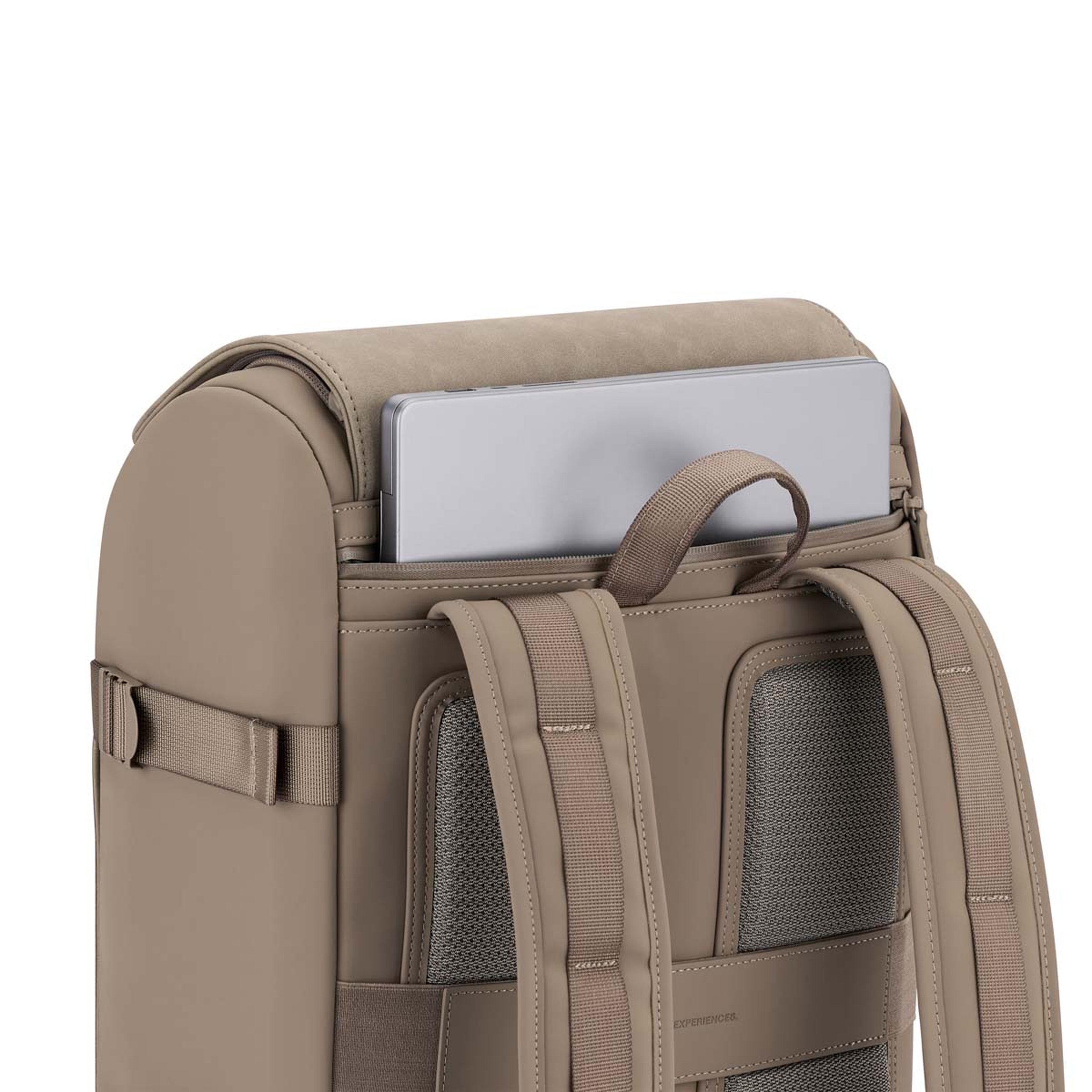 Backpack with a laptop partially inserted in the back compartment. The design is sleek and modern, with padded straps and mesh backing for comfort.